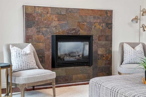 120 Lake Placid Road Se, Calgary, AB - Indoor Photo Showing Living Room With Fireplace