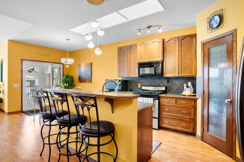 41 Stromsay Gate, Carstairs, AB - Indoor Photo Showing Kitchen