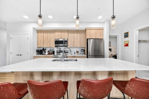 3208-220 Seton Grove Se, Calgary, AB - Indoor Photo Showing Kitchen With Double Sink With Upgraded Kitchen