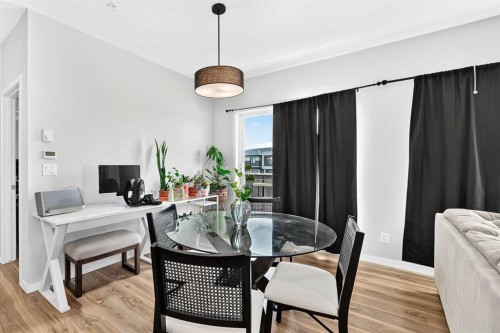 3208-220 Seton Grove Se, Calgary, AB - Indoor Photo Showing Dining Room