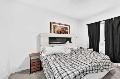 3208-220 Seton Grove Se, Calgary, AB - Indoor Photo Showing Bedroom