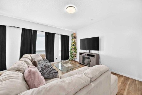 3208-220 Seton Grove Se, Calgary, AB - Indoor Photo Showing Living Room