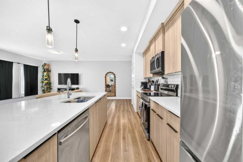 3208-220 Seton Grove Se, Calgary, AB - Indoor Photo Showing Kitchen With Double Sink With Upgraded Kitchen