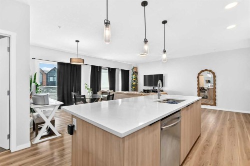 3208-220 Seton Grove Se, Calgary, AB - Indoor Photo Showing Kitchen