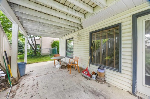 107 Hampshire Close Nw, Calgary, AB - Outdoor With Deck Patio Veranda With Exterior