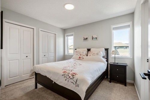 30 Wolf Crescent, Okotoks, AB - Indoor Photo Showing Bedroom