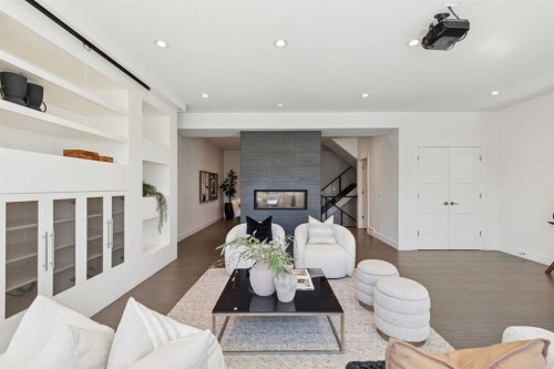 1711 27 Street Sw, Calgary, AB - Indoor Photo Showing Living Room With Fireplace