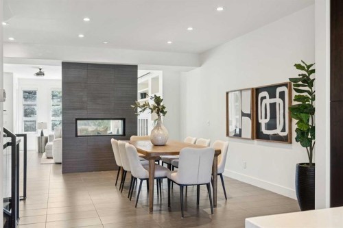 1711 27 Street Sw, Calgary, AB - Indoor Photo Showing Dining Room With Fireplace