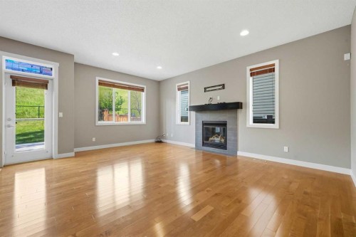 80 Sherwood Crescent Nw, Calgary, AB - Indoor Photo Showing Living Room With Fireplace
