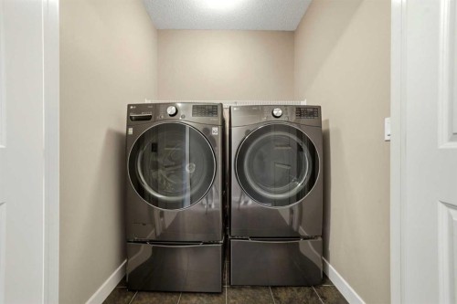 80 Sherwood Crescent Nw, Calgary, AB - Indoor Photo Showing Laundry Room