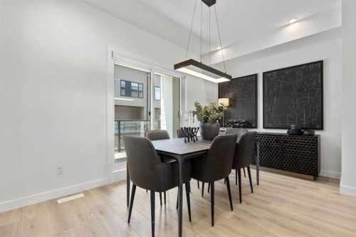 512-8155 8 Avenue Sw, Calgary, AB - Indoor Photo Showing Dining Room