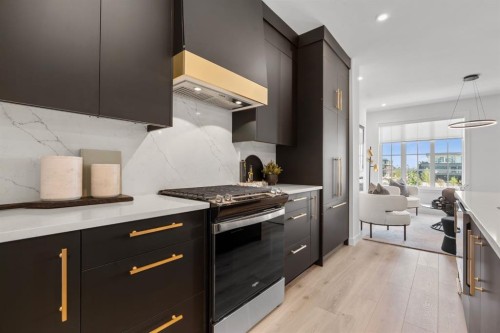 512-8155 8 Avenue Sw, Calgary, AB - Indoor Photo Showing Kitchen With Upgraded Kitchen