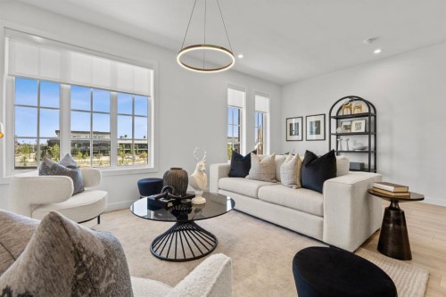 512-8155 8 Avenue Sw, Calgary, AB - Indoor Photo Showing Living Room