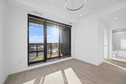 701-8375 Broadcast Avenue Sw, Calgary, AB - Indoor Photo Showing Other Room
