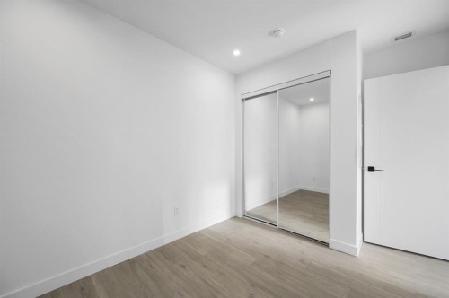 701-8375 Broadcast Avenue Sw, Calgary, AB - Indoor Photo Showing Other Room