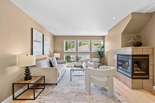 415 28 Avenue Nw, Calgary, AB - Indoor Photo Showing Living Room With Fireplace