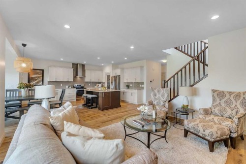 83 Ravenscroft Close Se, Airdrie, AB - Indoor Photo Showing Living Room