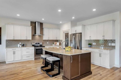 83 Ravenscroft Close Se, Airdrie, AB - Indoor Photo Showing Kitchen With Upgraded Kitchen
