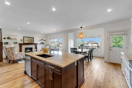83 Ravenscroft Close Se, Airdrie, AB - Indoor With Fireplace