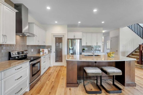 83 Ravenscroft Close Se, Airdrie, AB - Indoor Photo Showing Kitchen With Upgraded Kitchen