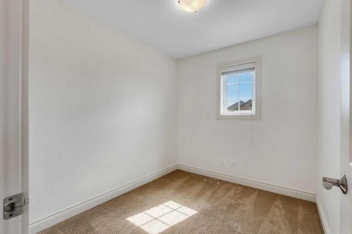 83 Ravenscroft Close Se, Airdrie, AB - Indoor Photo Showing Other Room