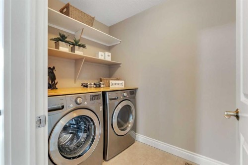 83 Ravenscroft Close Se, Airdrie, AB - Indoor Photo Showing Laundry Room