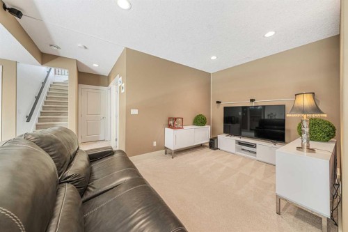 2 Discovery Ridge Heights Sw, Calgary, AB - Indoor Photo Showing Living Room