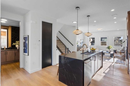 13 Topaz Place, Cochrane, AB - Indoor Photo Showing Kitchen With Upgraded Kitchen