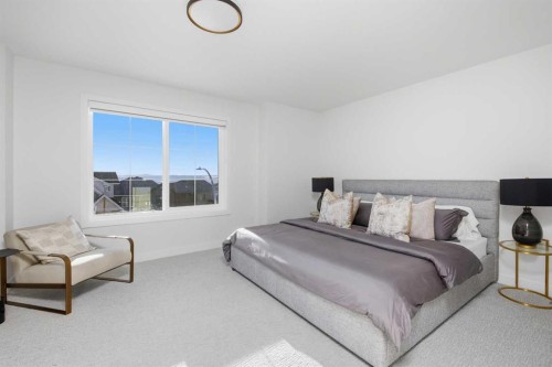 13 Topaz Place, Cochrane, AB - Indoor Photo Showing Bedroom