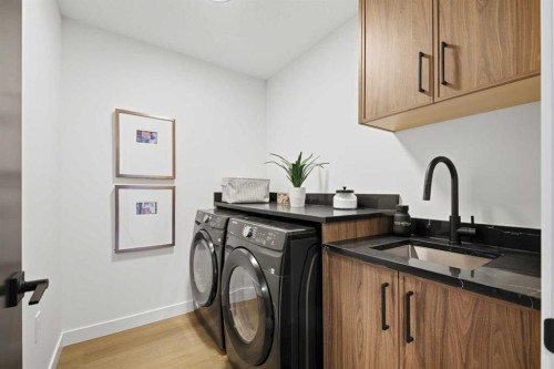 13 Topaz Place, Cochrane, AB - Indoor Photo Showing Laundry Room