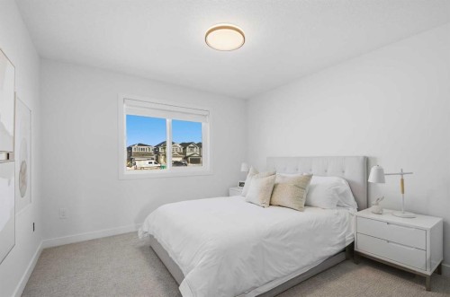 13 Topaz Place, Cochrane, AB - Indoor Photo Showing Bedroom