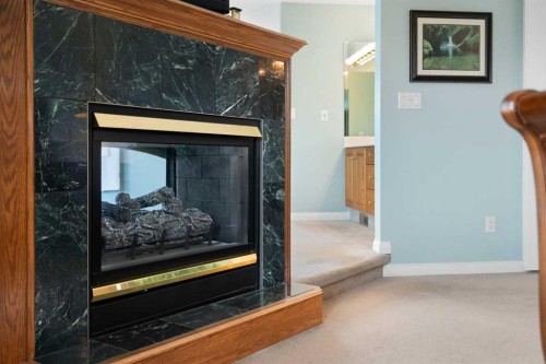 1649 Evergreen Hill Sw, Calgary, AB - Indoor With Fireplace