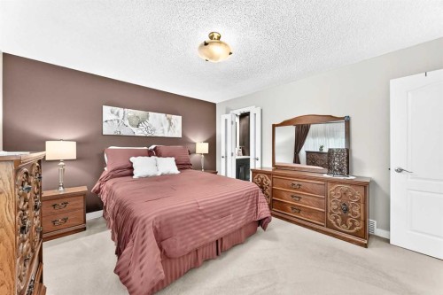 39 Deer Run Place Se, Calgary, AB - Indoor Photo Showing Bedroom