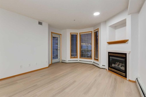 244-8535 Bonaventure Drive Se, Calgary, AB - Indoor With Fireplace