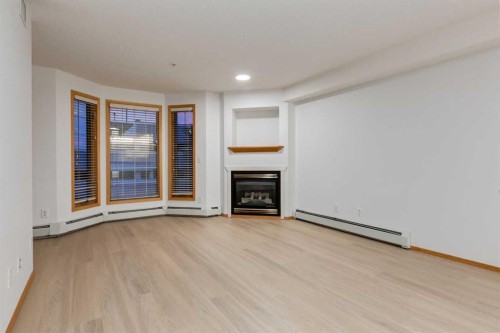 244-8535 Bonaventure Drive Se, Calgary, AB - Indoor With Fireplace