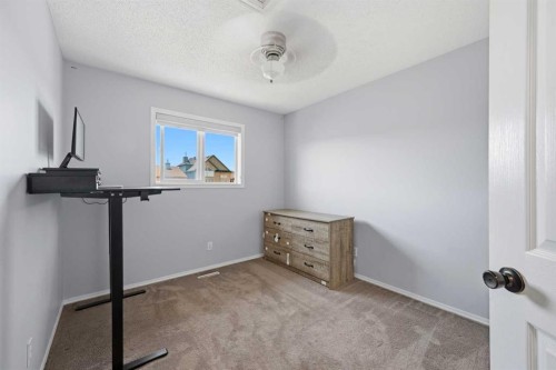33 Saddlecrest Close Ne, Calgary, AB - Indoor Photo Showing Gym Room