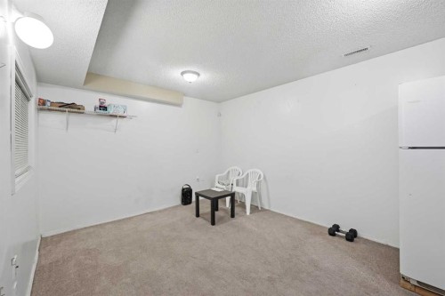 33 Saddlecrest Close Ne, Calgary, AB - Indoor Photo Showing Other Room