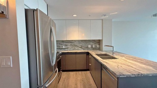 1207-510 6 Avenue Se, Calgary, AB - Indoor Photo Showing Kitchen With Stainless Steel Kitchen With Double Sink