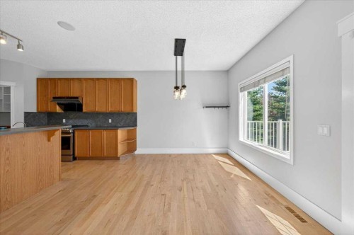 18 Cougarstone Bay Sw, Calgary, AB - Indoor Photo Showing Kitchen