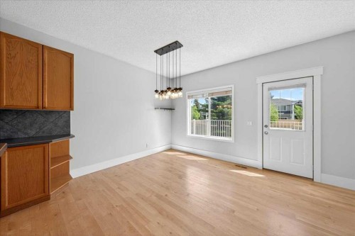 18 Cougarstone Bay Sw, Calgary, AB - Indoor Photo Showing Other Room