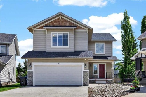 18 Cougarstone Bay Sw, Calgary, AB - Outdoor With Facade