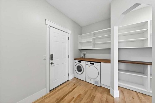 18 Cougarstone Bay Sw, Calgary, AB - Indoor Photo Showing Laundry Room
