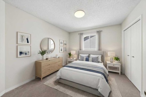 18 Cougarstone Bay Sw, Calgary, AB - Indoor Photo Showing Bedroom