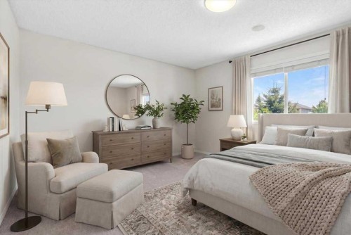 18 Cougarstone Bay Sw, Calgary, AB - Indoor Photo Showing Bedroom