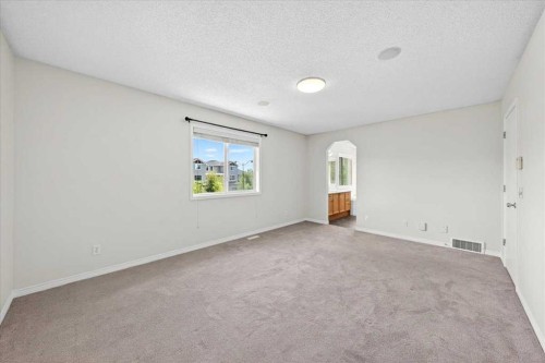 18 Cougarstone Bay Sw, Calgary, AB - Indoor Photo Showing Other Room