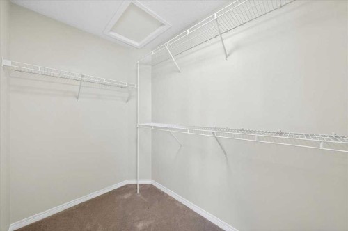18 Cougarstone Bay Sw, Calgary, AB - Indoor With Storage