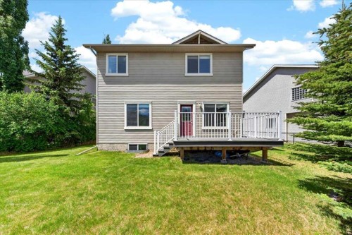 18 Cougarstone Bay Sw, Calgary, AB - Outdoor With Deck Patio Veranda