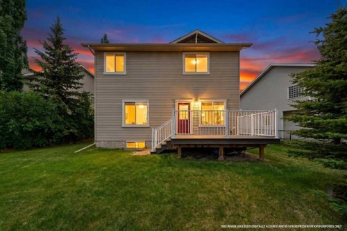 18 Cougarstone Bay Sw, Calgary, AB - Outdoor With Deck Patio Veranda