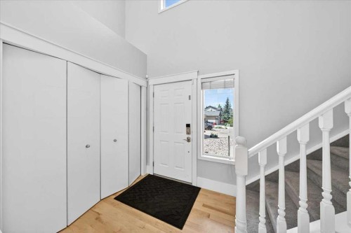 18 Cougarstone Bay Sw, Calgary, AB - Indoor Photo Showing Other Room