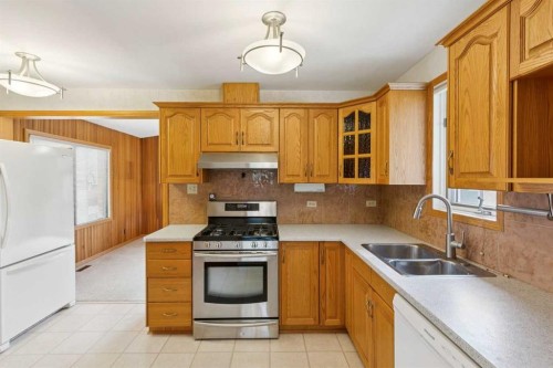 47 Montrose Crescent Ne, Calgary, AB - Indoor Photo Showing Kitchen With Double Sink